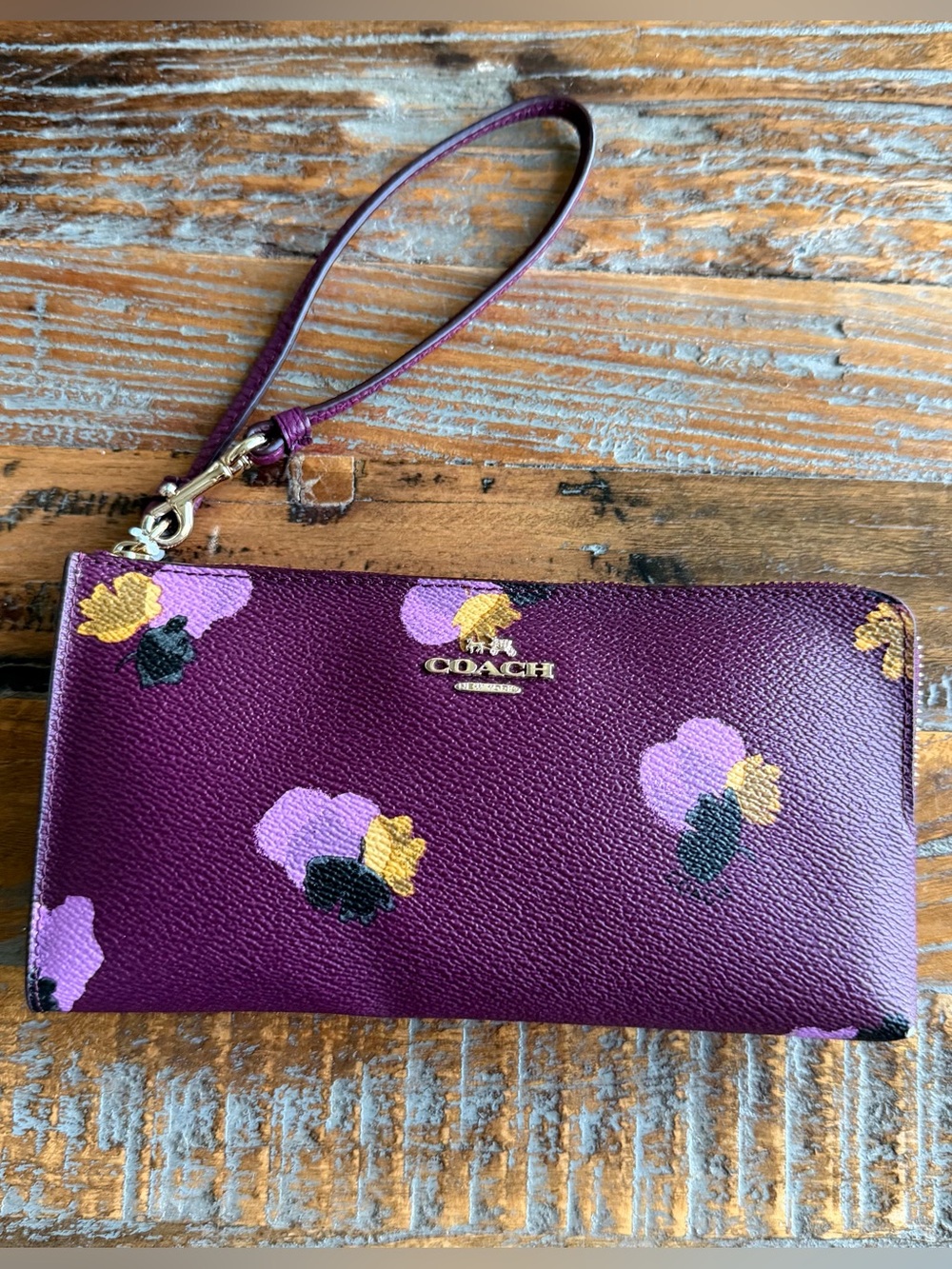 COACH Plum Floral Wristlet with Gold Logo